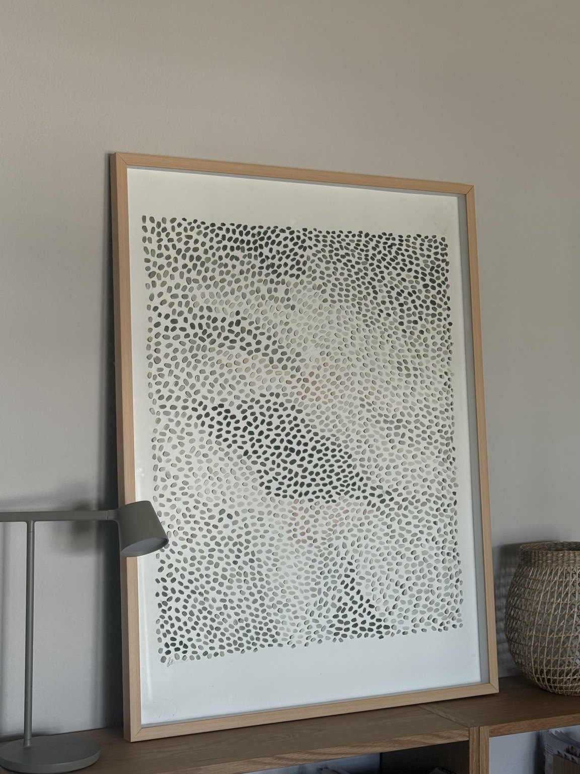 Framed Leva Art piece in a home interior