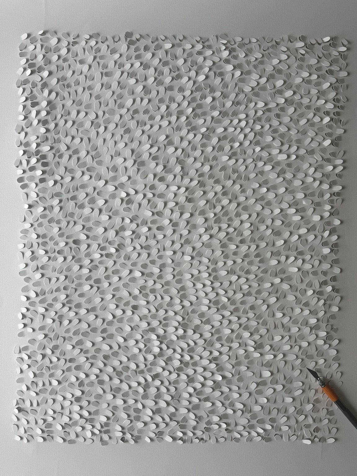 Textured white paper artwork